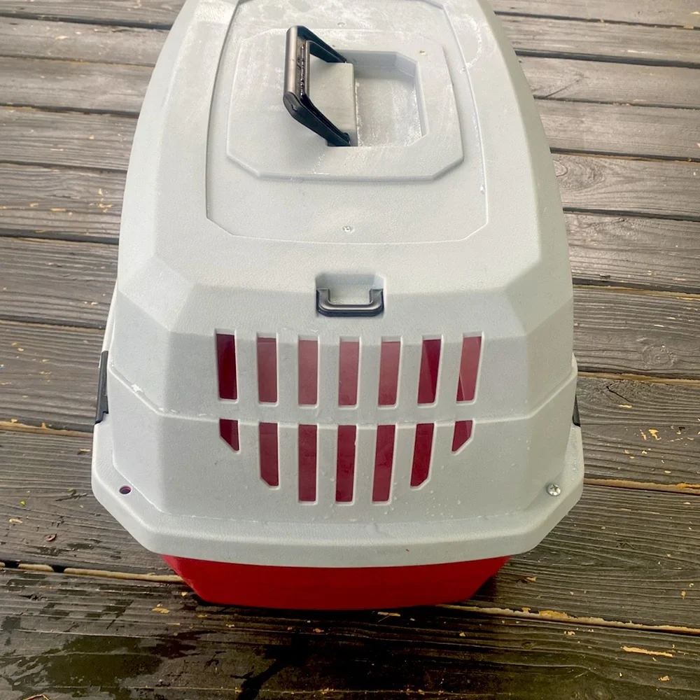 USED TRAVEL PET CARRIER INCLUDES SMALL PINK BOWL